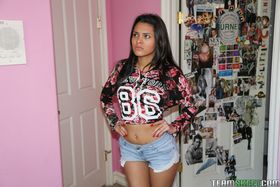 Perky titted Latina teen Josie Jagger takes off her bra and undresses