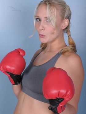 Female boxer Natalie Norton spreads her pussy lips on the office table