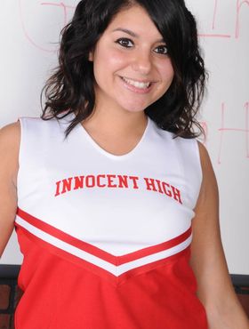 Dark haired cheerleader Christina Moure strips from her uniform