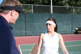 Naughty tennis player Denice Dark reveals those natural tits and shaved pussy