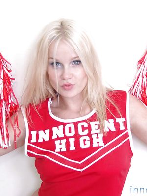 Innocent High - Schoolgirl cheerleader Kylee is a blonde babe that is undressing for us
