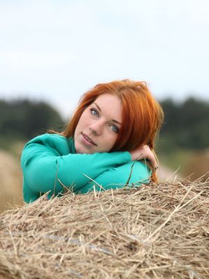 Errotica Archives - Natural redhead Amber A poses her naked teen body on round bale of hay