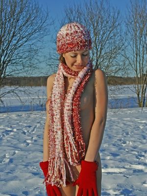 Erotic Beauty - Fair skinned girl Dasha G sports hard nipples during nude poses in the snow