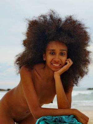 Errotica Archives - Slim black teen with big hair Isadora touts her hot ass in the nude on a beach